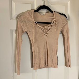 SMALL URBAN OUTFITTERS X SOCIAL T LONG-SLEEVE SEXY TOP